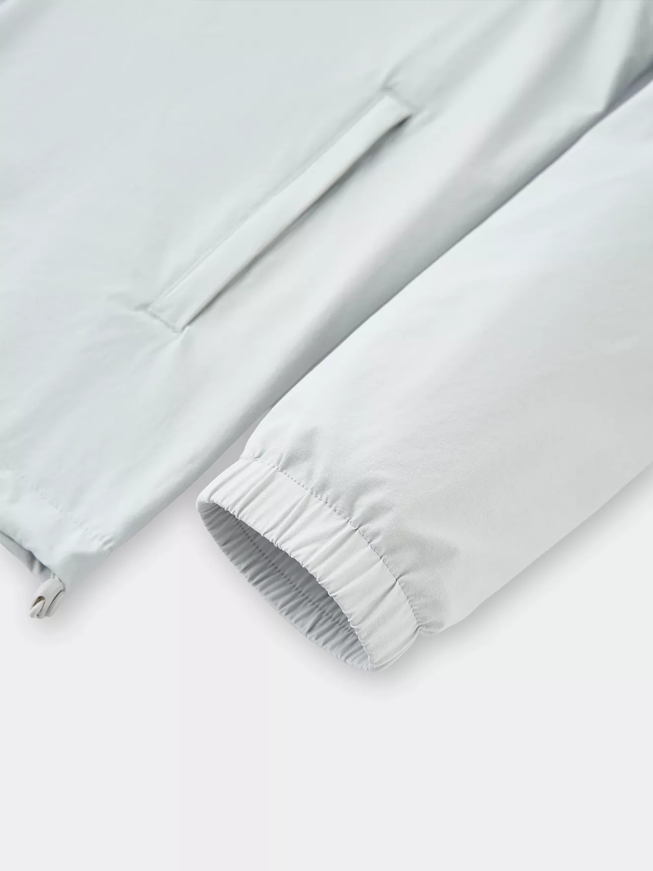 Áo Khoác Gió Nữ PERATO Phong Cách Training Can Phối TBKGW5W021