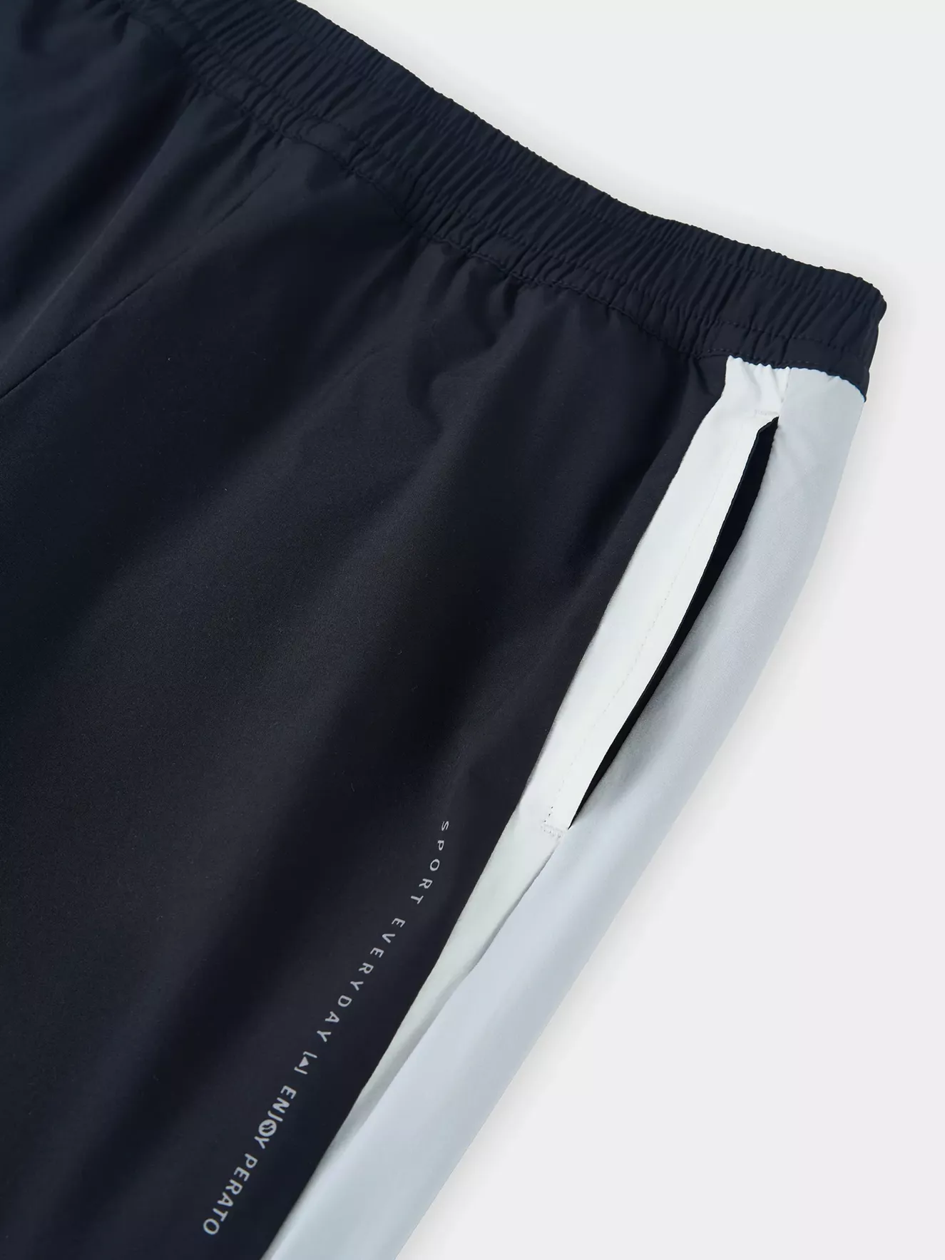 Quần Gió Dài Nữ PERATO Can Phối Lót Vải Lưới Thoáng Khí TBQGW5W021