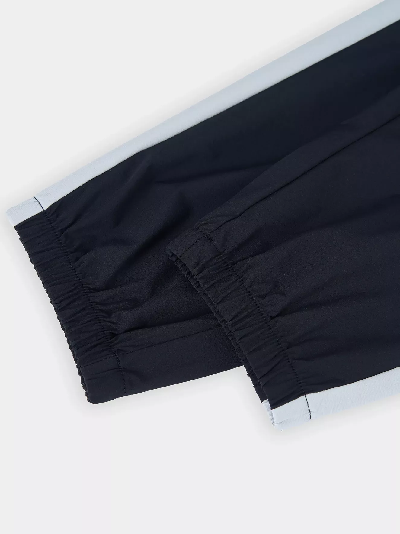 Quần Gió Dài Nữ PERATO Can Phối Lót Vải Lưới Thoáng Khí TBQGW5W021