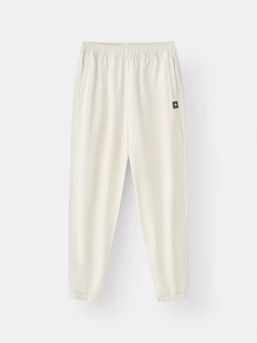 Quần Dài Thể Thao Nữ Training PERATO Vải Gió TBQGW5W024